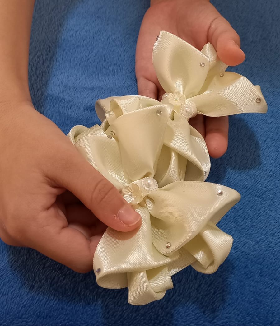 Luz de Perla Moño artesanal infantil